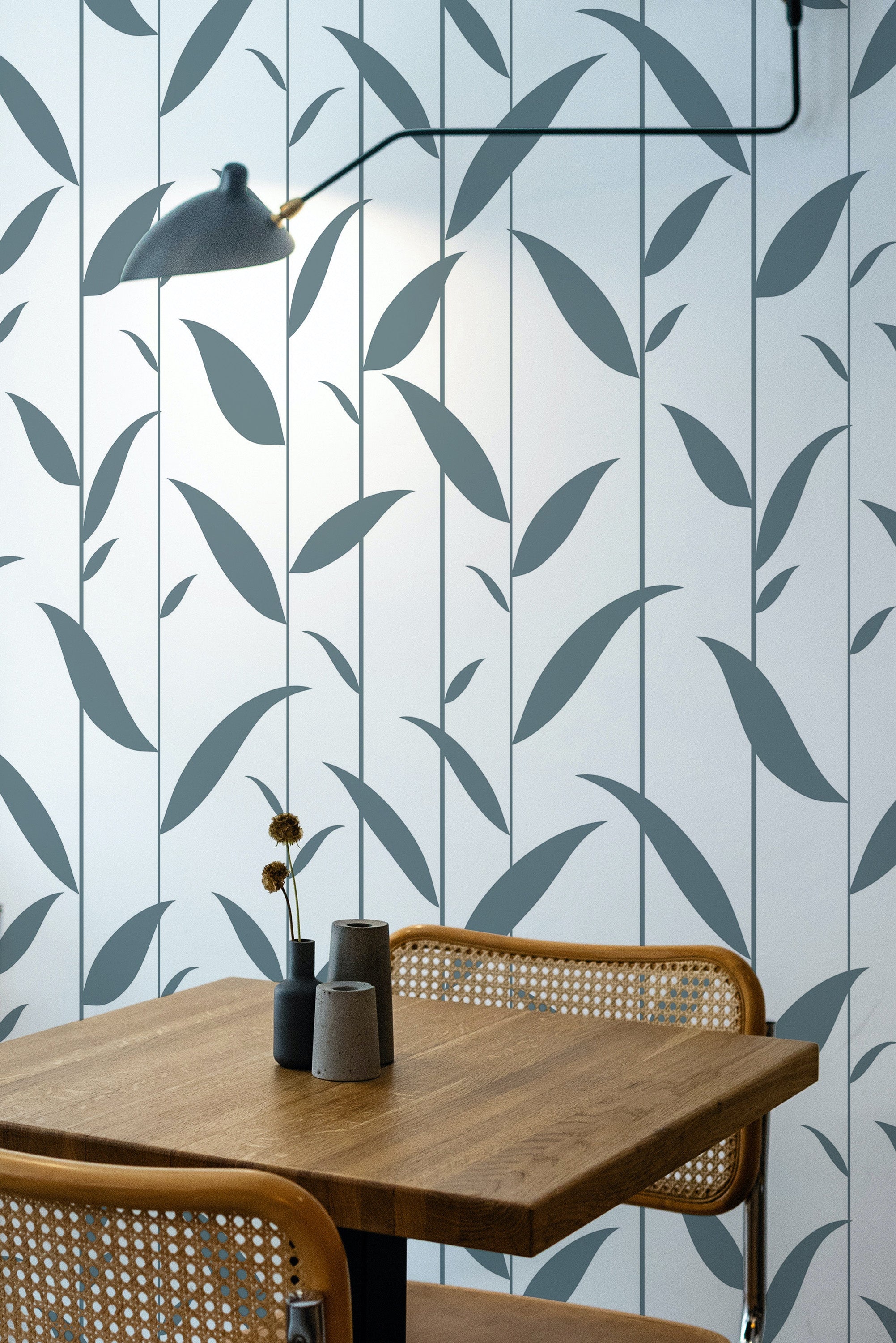 Self-adhesive wallpaper with a Leaf line design in a soft gray color on a white background, creating a nature-inspired vertical pattern.