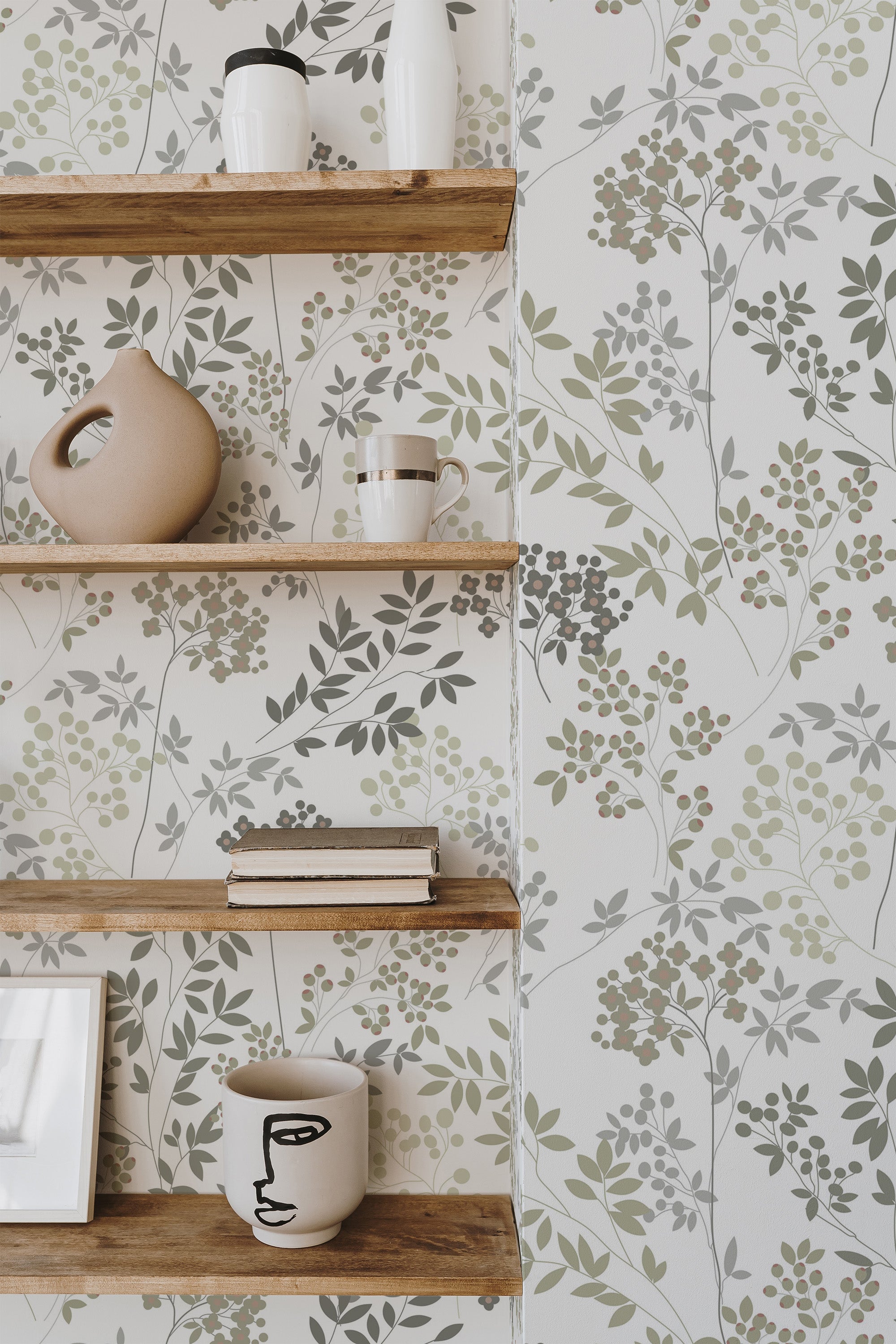 Self-adhesive wallpaper with an elegant floral design, comprising delicate green and gray leaves accompanied by small clusters of soft, muted flowers.