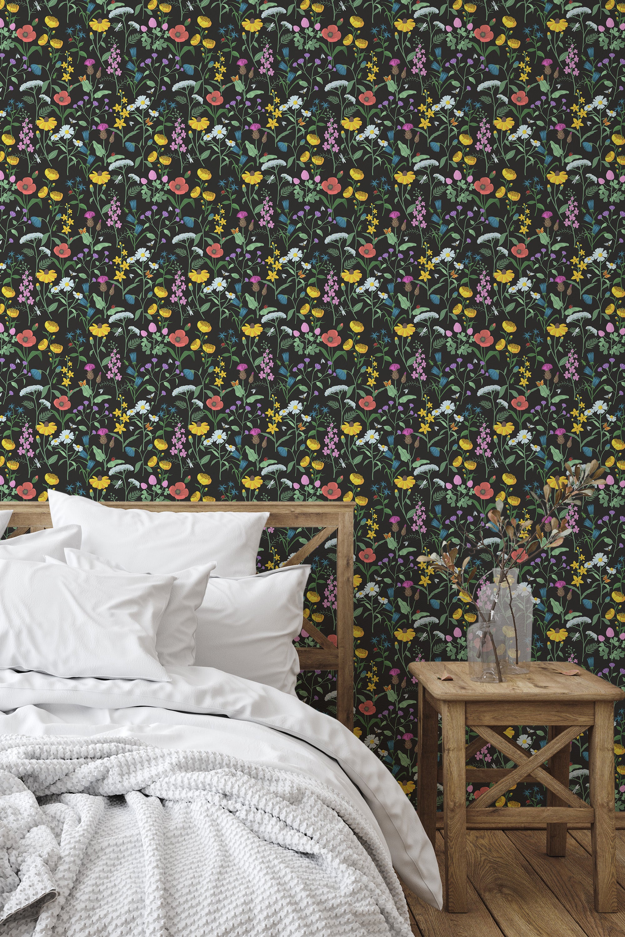 Self-adhesive wallpaper with a Meadow design. A dark background with a variety of colorful wildflowers, including yellow, pink, and purple flowers, along with green leaves and stems, creating a vibrant and natural look.