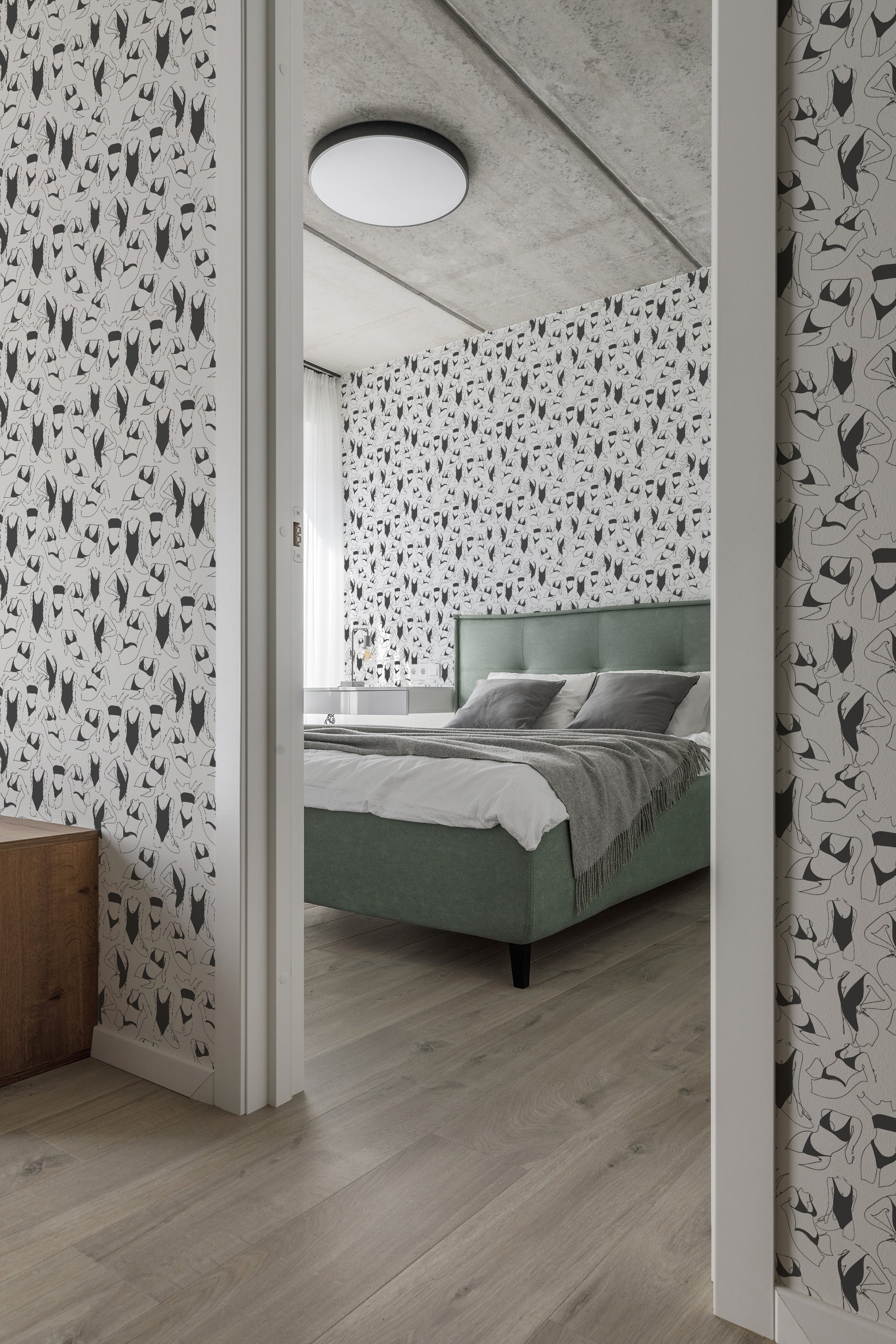 Black and white abstract female body shapes cover the walls in a repeating pattern as traditional wallpaper.