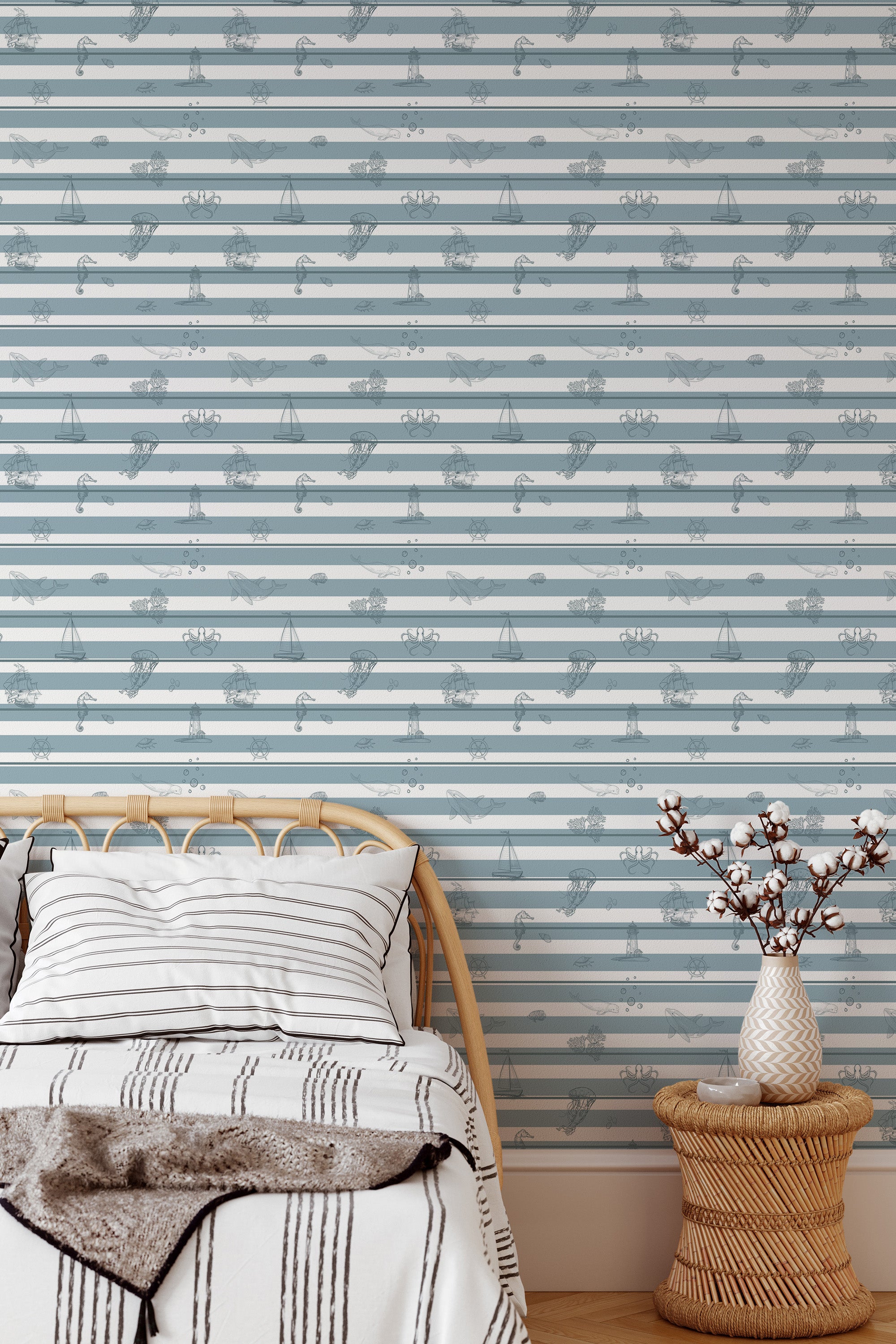 Self-adhesive wallpaper with a Deep Sea design featuring light blue nautical stripes, interspersed with subtle maritime-themed illustrations.