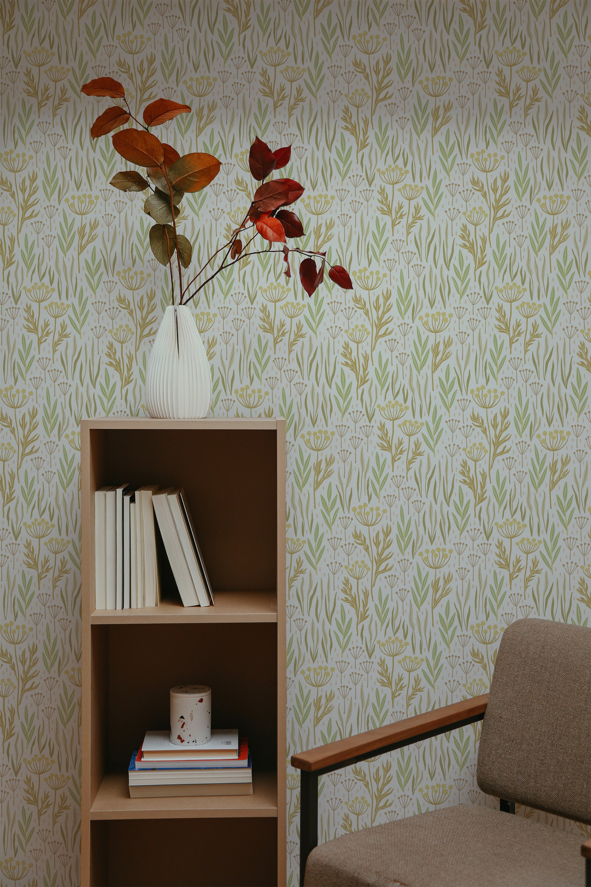 Self-adhesive wallpaper with a Pastel Garden design in soft tones of green, yellow, and beige, with delicate floral and leafy patterns.