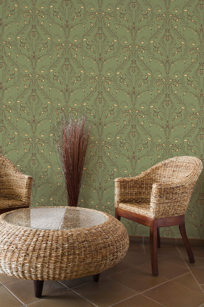 Self-adhesive olive green wallpaper with an intricate damask pattern, intertwined with elegant gold accents, covering the wall in a cozy room with wicker furniture.