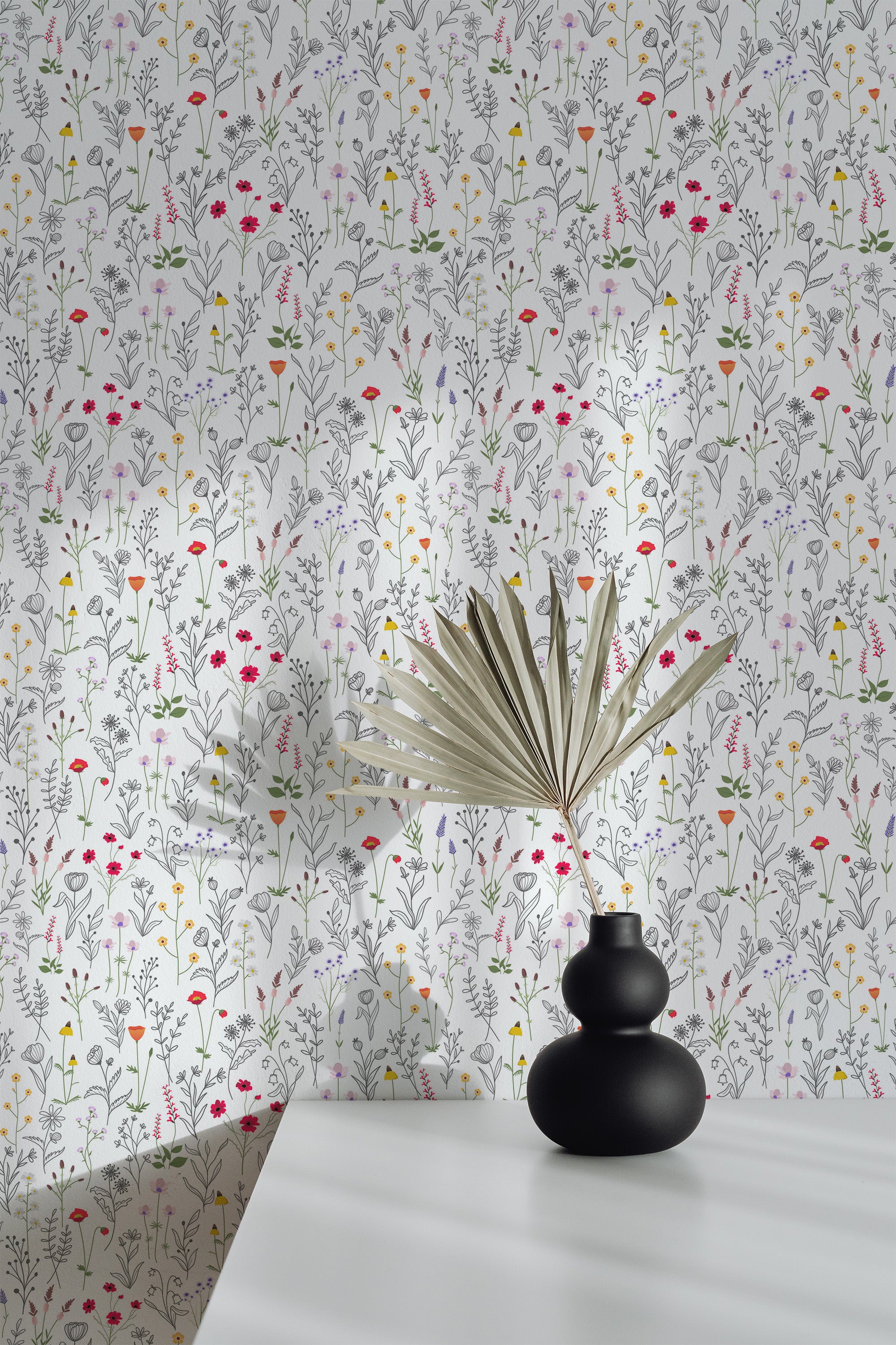 Self-adhesive floral wallpaper with a delicate pattern of small, colorful flowers and leaves on a light background.