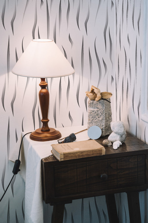 peel and stick wallpaper zebra stripe pattern accent wall bedroom nightstand interior