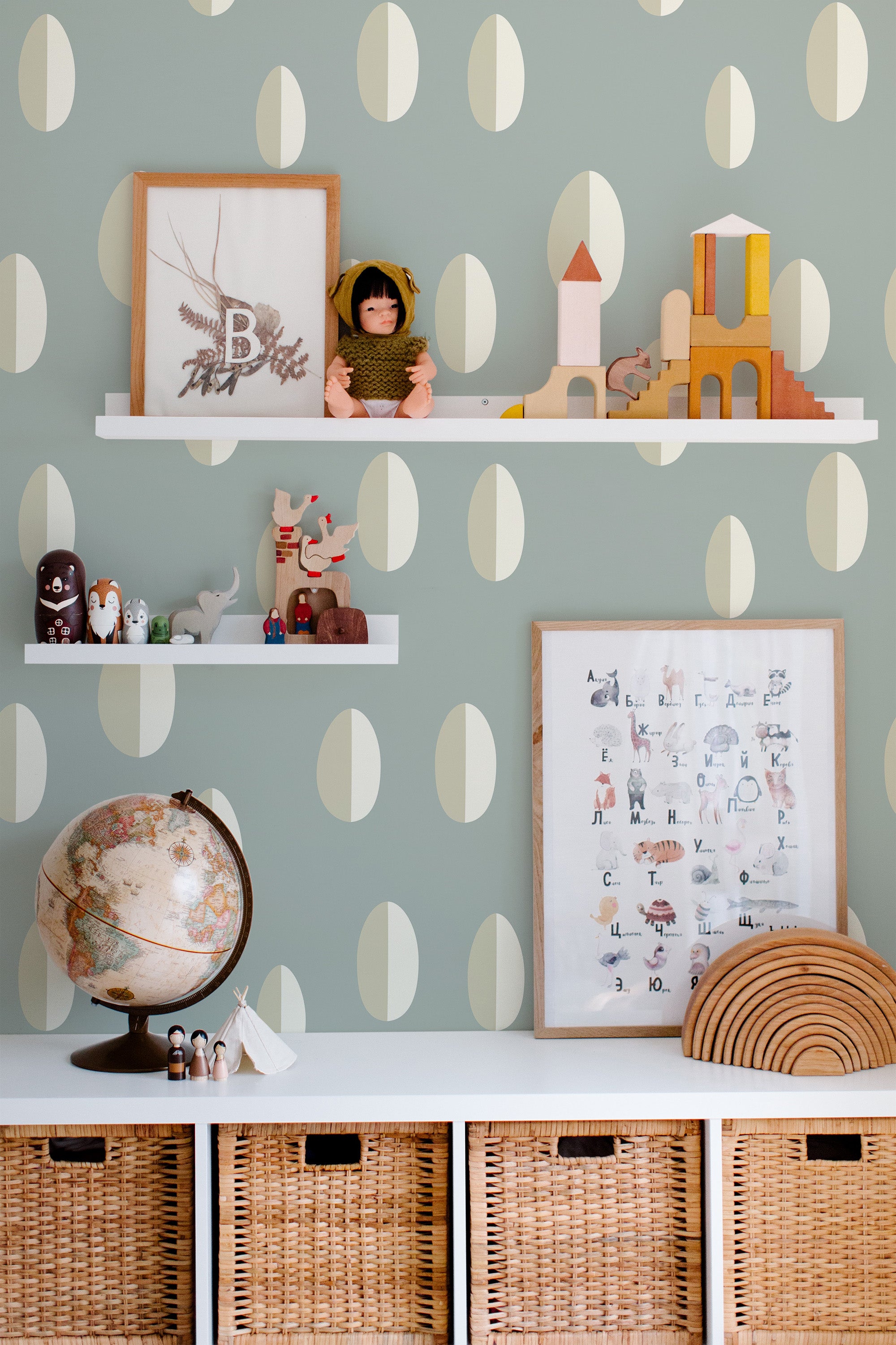 Self-adhesive wallpaper featuring a raindrop pattern on a soft green background with white teardrop shapes arranged in a symmetrical, repeating pattern.