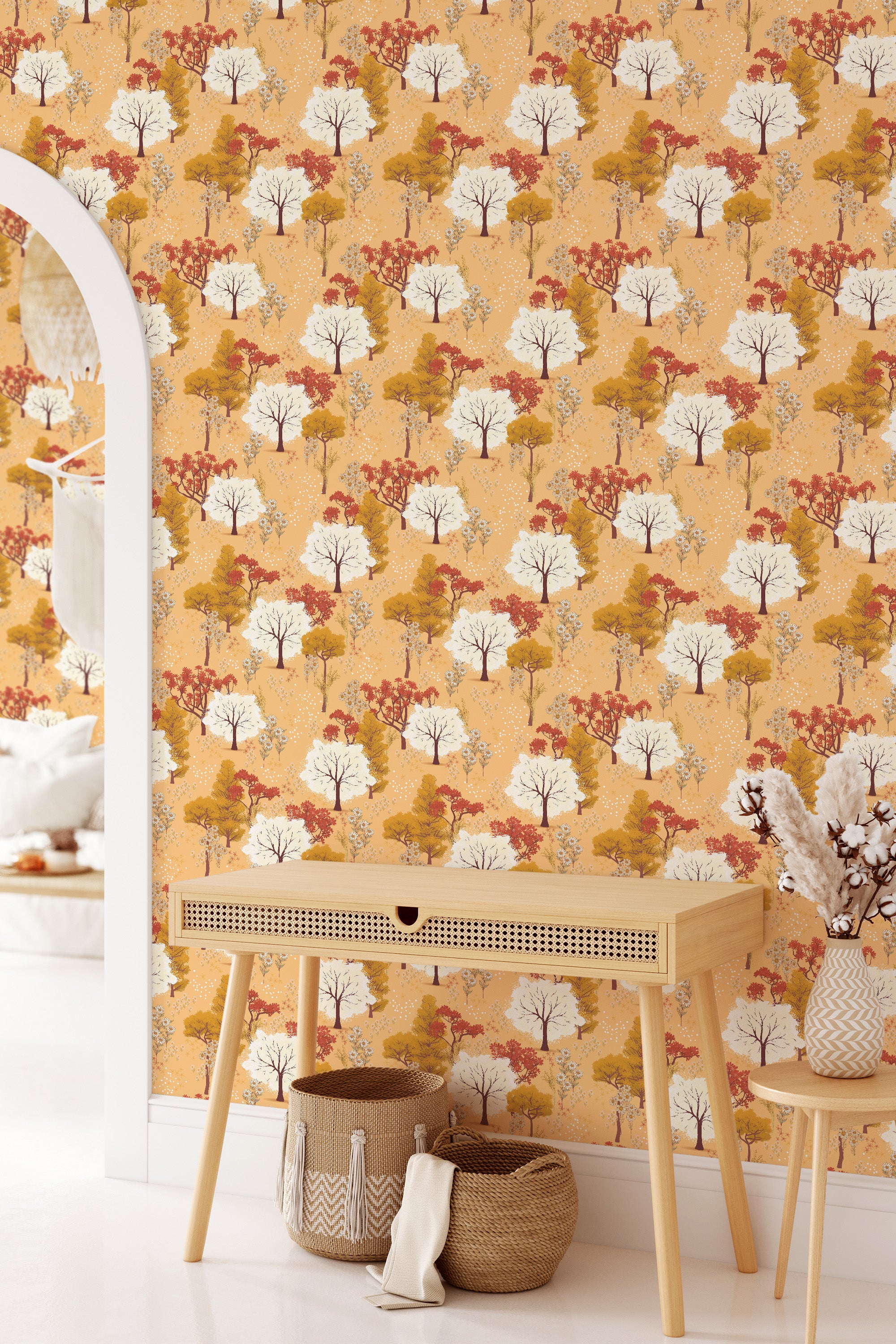 Wallpaper with a Magical Forest design of trees in warm autumn colors like orange, yellow, and beige on a light background, giving the room a cozy, nature-inspired atmosphere. Traditional wallpaper.