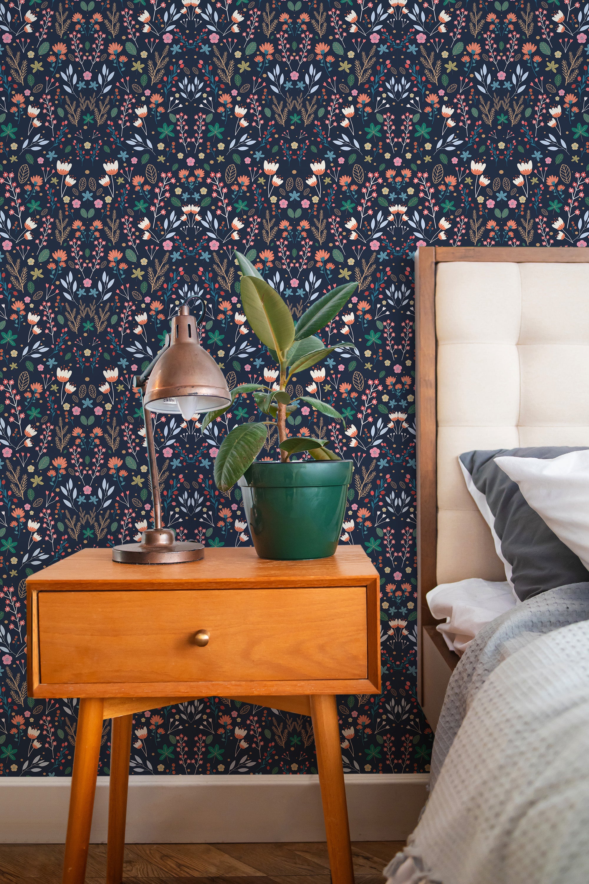 Self-adhesive dark Scandinavian floral wallpaper with intricate patterns of delicate flowers, leaves, and plants in muted tones on a deep, rich background.