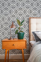 stylish bedroom interior nightstand plant lamp black art deco paisley accent wall