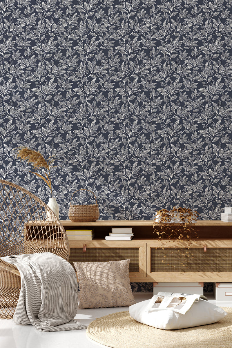 Navy-colored wallpaper with an intricate leaf pattern in light beige, creating a subtle contrast and elegant look in the room,raditional wallpaper.