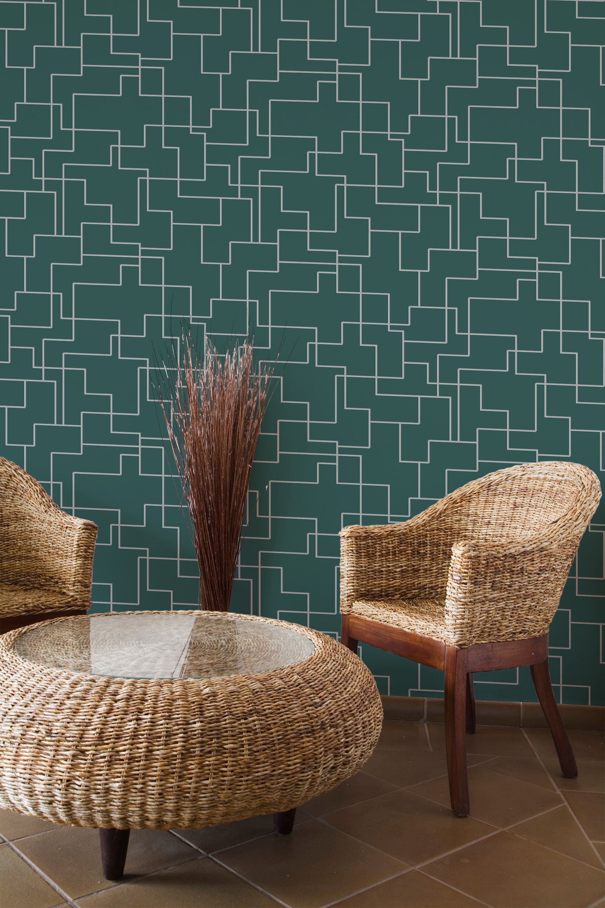 Self-adhesive emerald green geometric wallpaper with interlocking white lines forming a complex, abstract pattern against a rich, deep green background in a modern room setting.