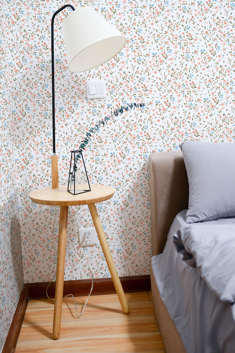 Self-adhesive wallpaper with a vintage small flowers design, featuring delicate, colorful floral patterns on a light background, adding a charming and cozy touch to the room.