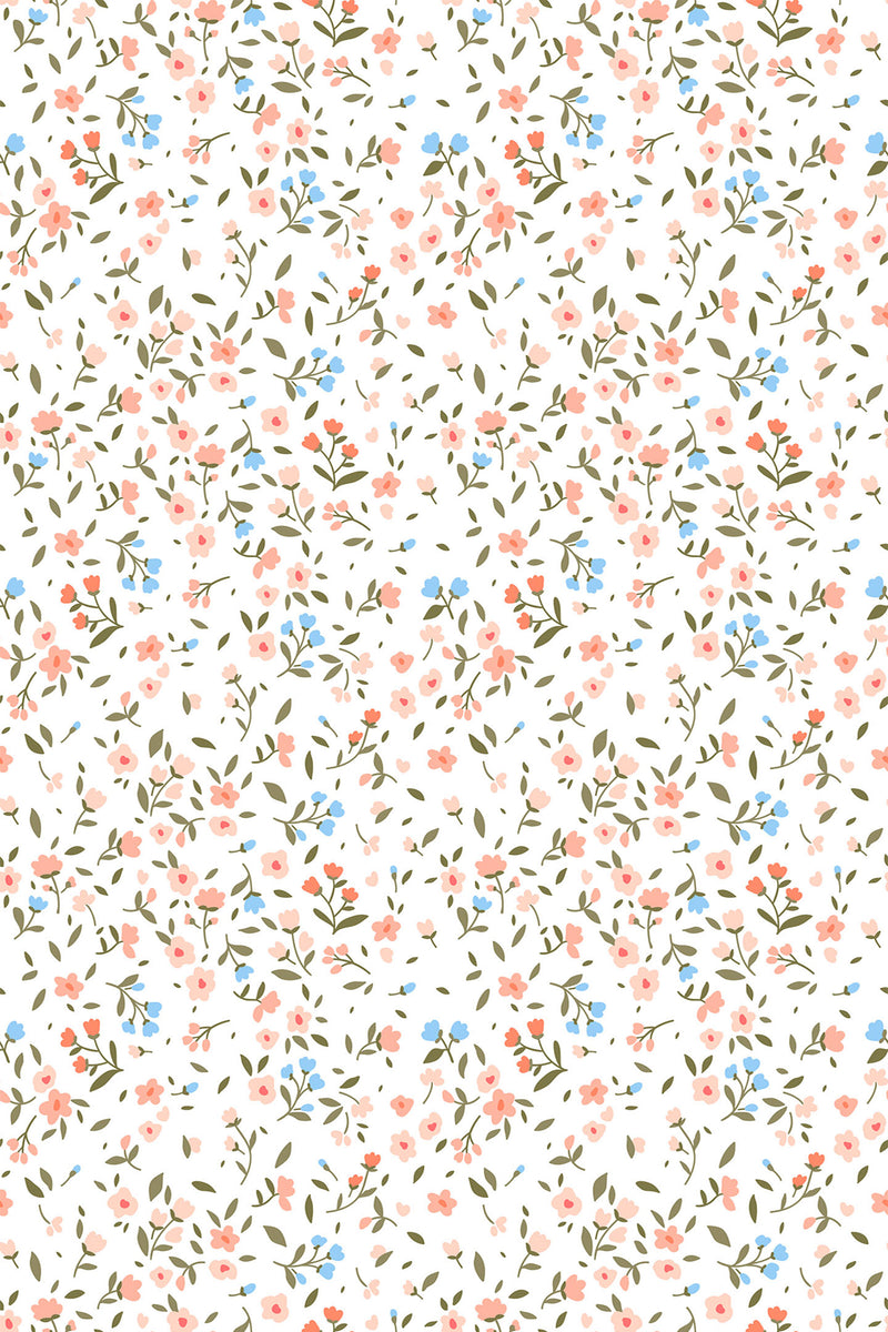 Delicate vintage floral pattern with small pink and blue flowers interspersed with green leaves on a white background. Peel and stick removable wallpaper.