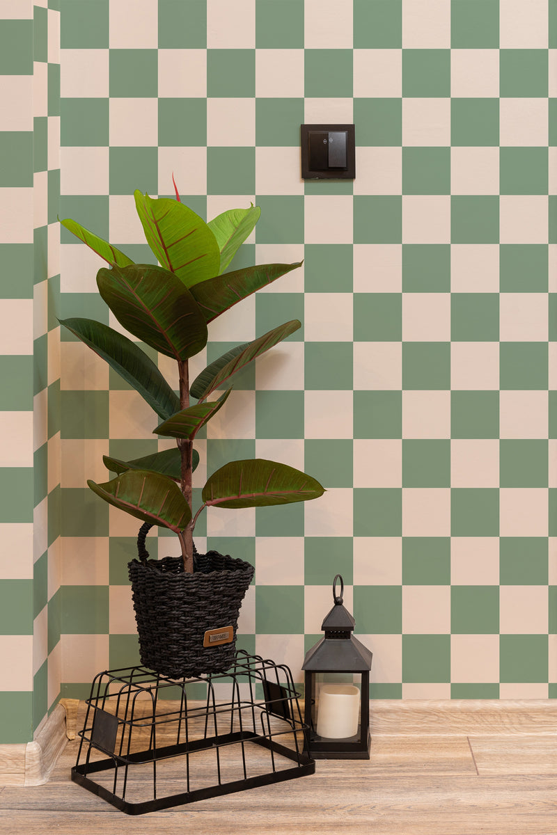 Self-adhesive Sage green checkered wallpaper with a pattern of alternating green and white squares, adding a vintage-inspired, geometric design to the wall.