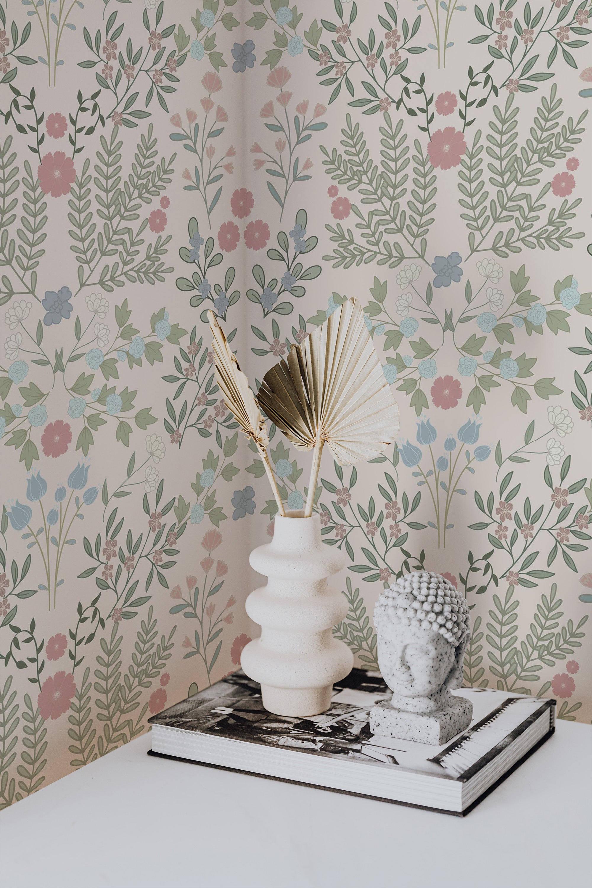 Self-adhesive pastel floral garden wallpaper with delicate pink, blue, and green flowers intertwined with leafy branches in a soft and natural pattern on a light background.