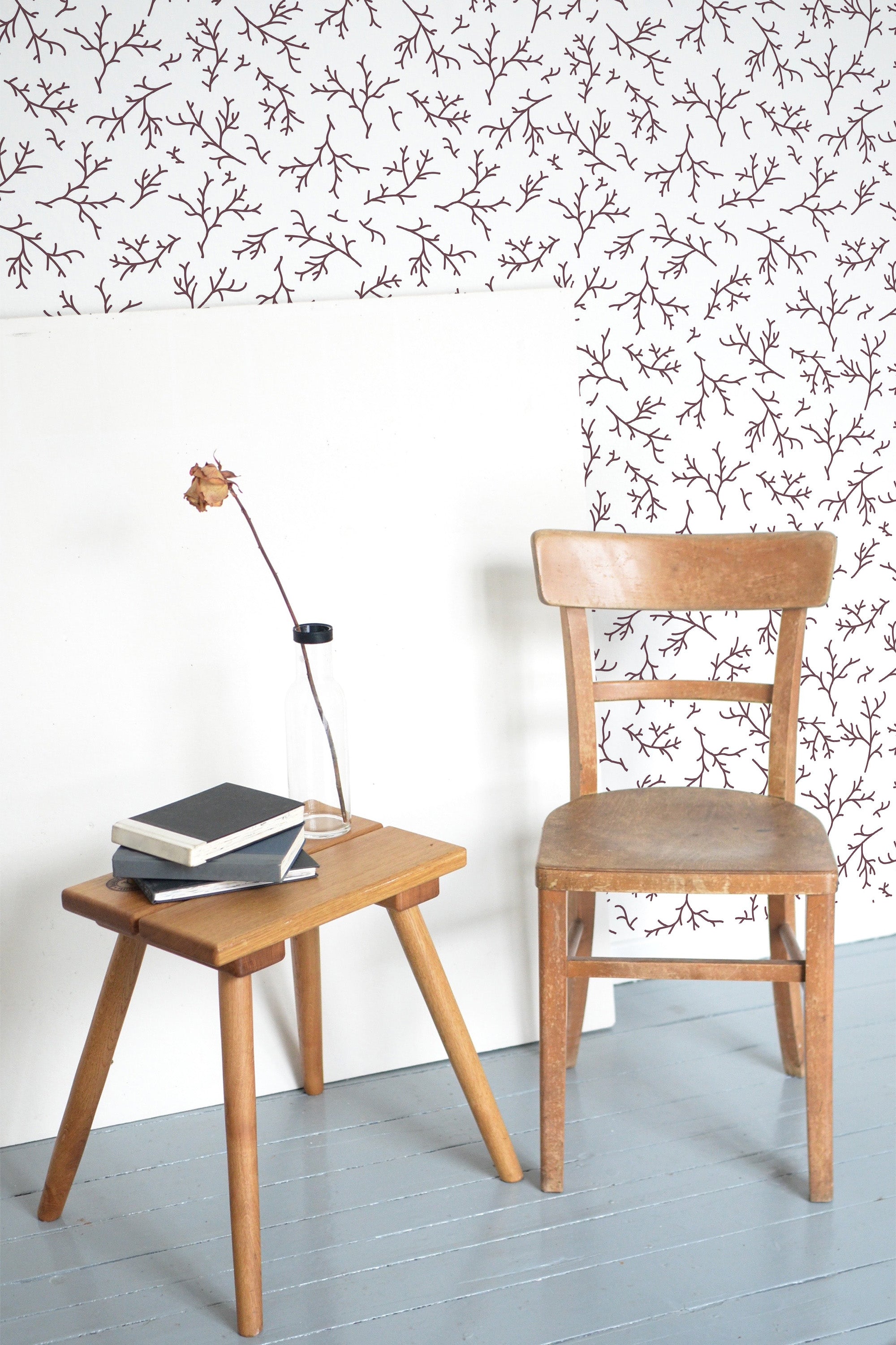 Self-adhesive wallpaper with a Burgundy branch design, featuring delicate, intertwining branches in a rich burgundy color on a light background.