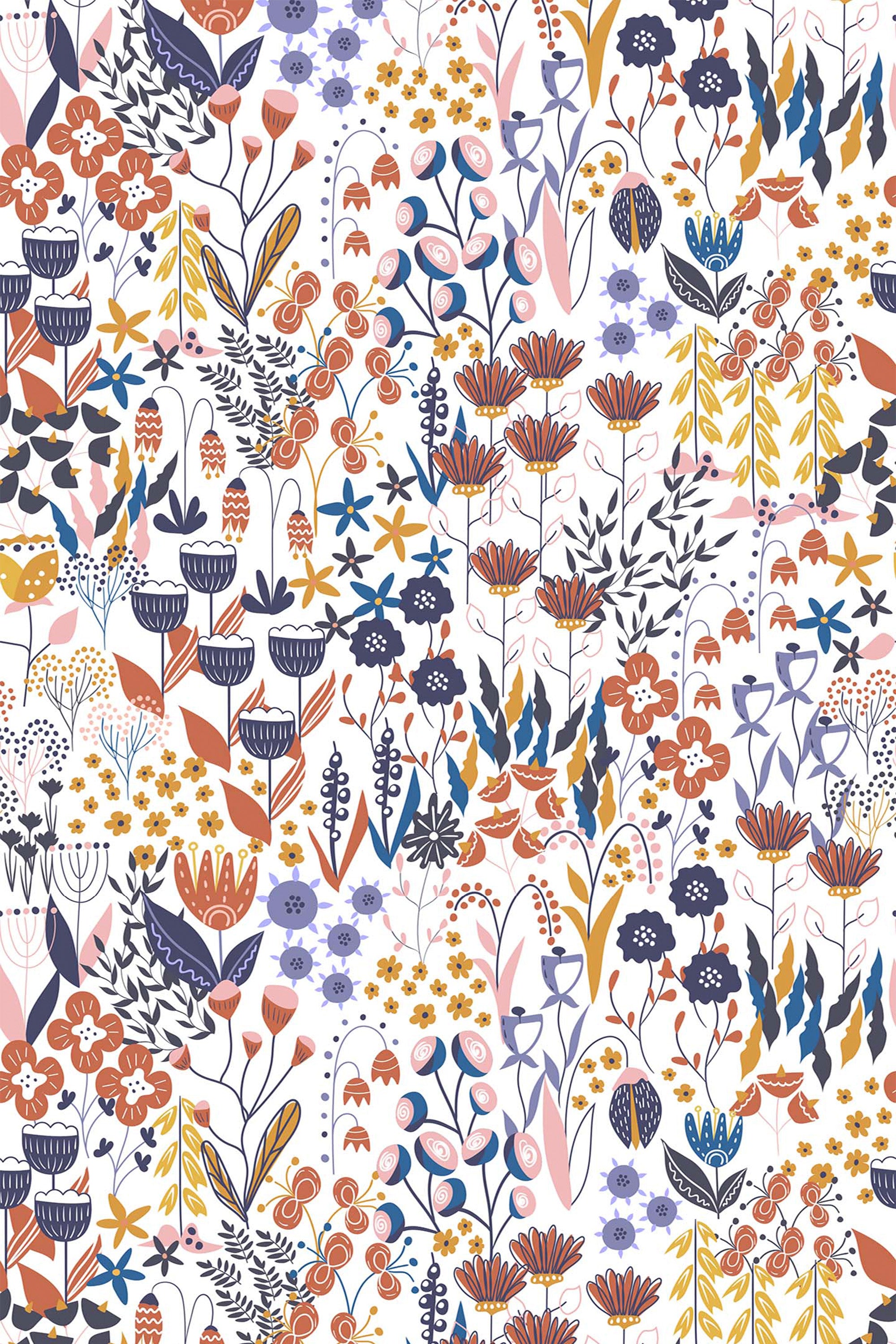 A whimsical pattern of colorful floral meadow elements with various flowers, leaves, and stems in shades of orange, blue, purple, and mustard yellow against a white background, peel and stick removable wallpaper.