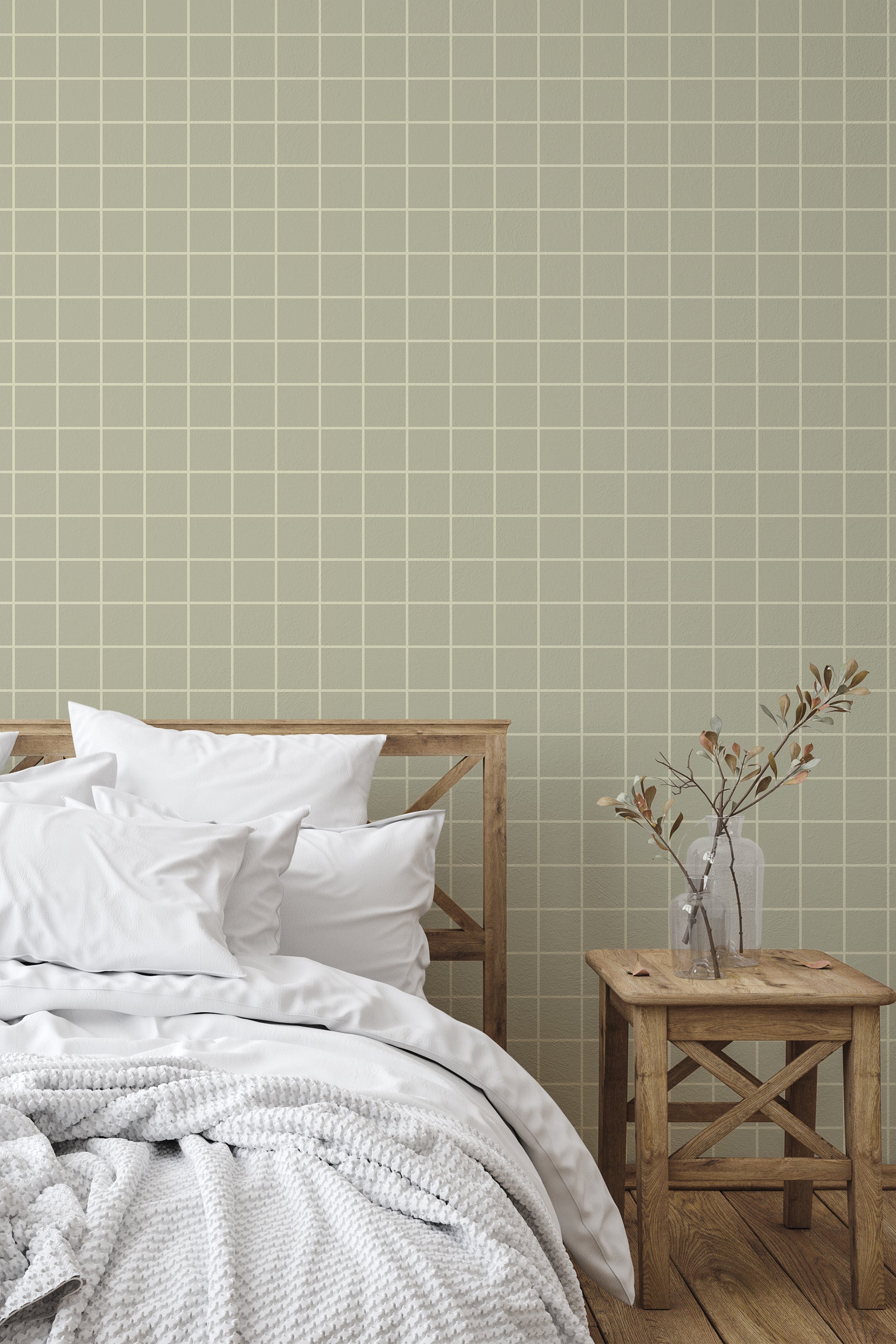 Self-adhesive wallpaper with a sage green grid pattern, featuring evenly spaced, thin white lines that create clean, minimalist squares over a soft green background.