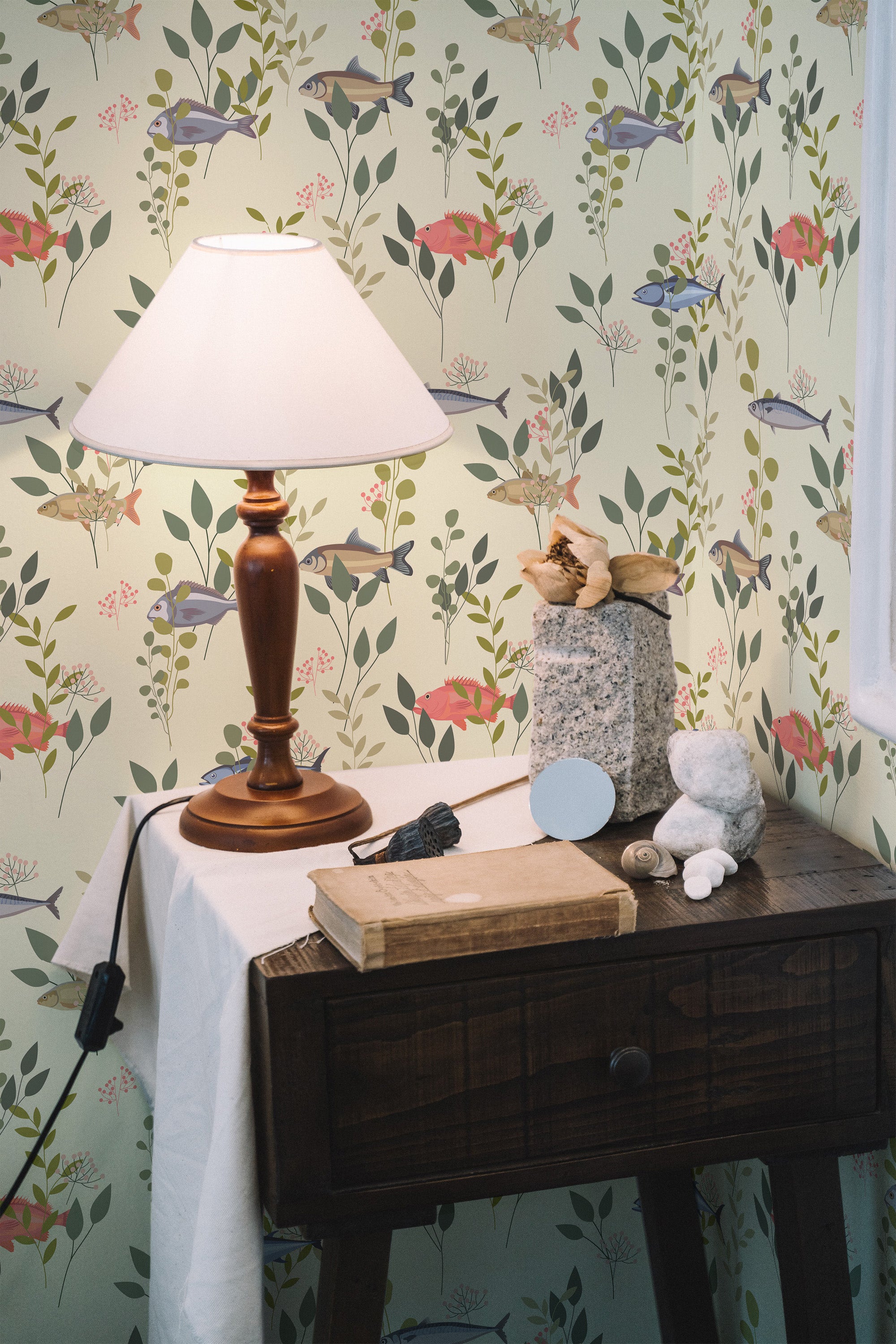 Self-adhesive wallpaper with a nature-inspired design of green leaves, red and pink flowers, and blue fish, set against a soft cream background.