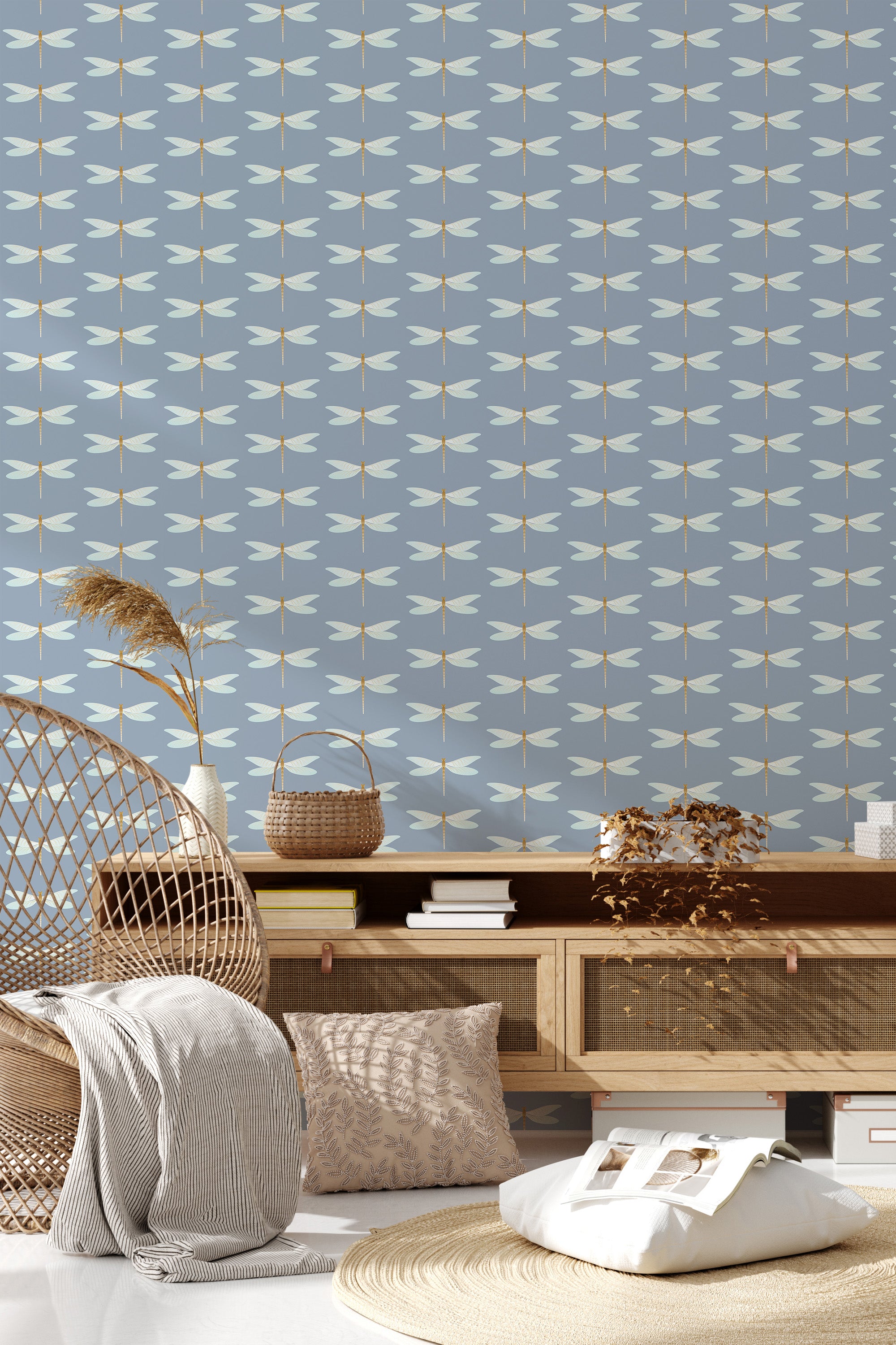 Blue wallpaper with a repetitive pattern of gold and white dragonflies, arranged in a geometrical grid. The dragonflies have symmetrical wings, creating a clean and orderly design against a soft blue background. This classic design adds a natural and elegant touch to interior decor, perfect for spaces looking to incorporate elements of nature and refinement within traditional wallpaper.