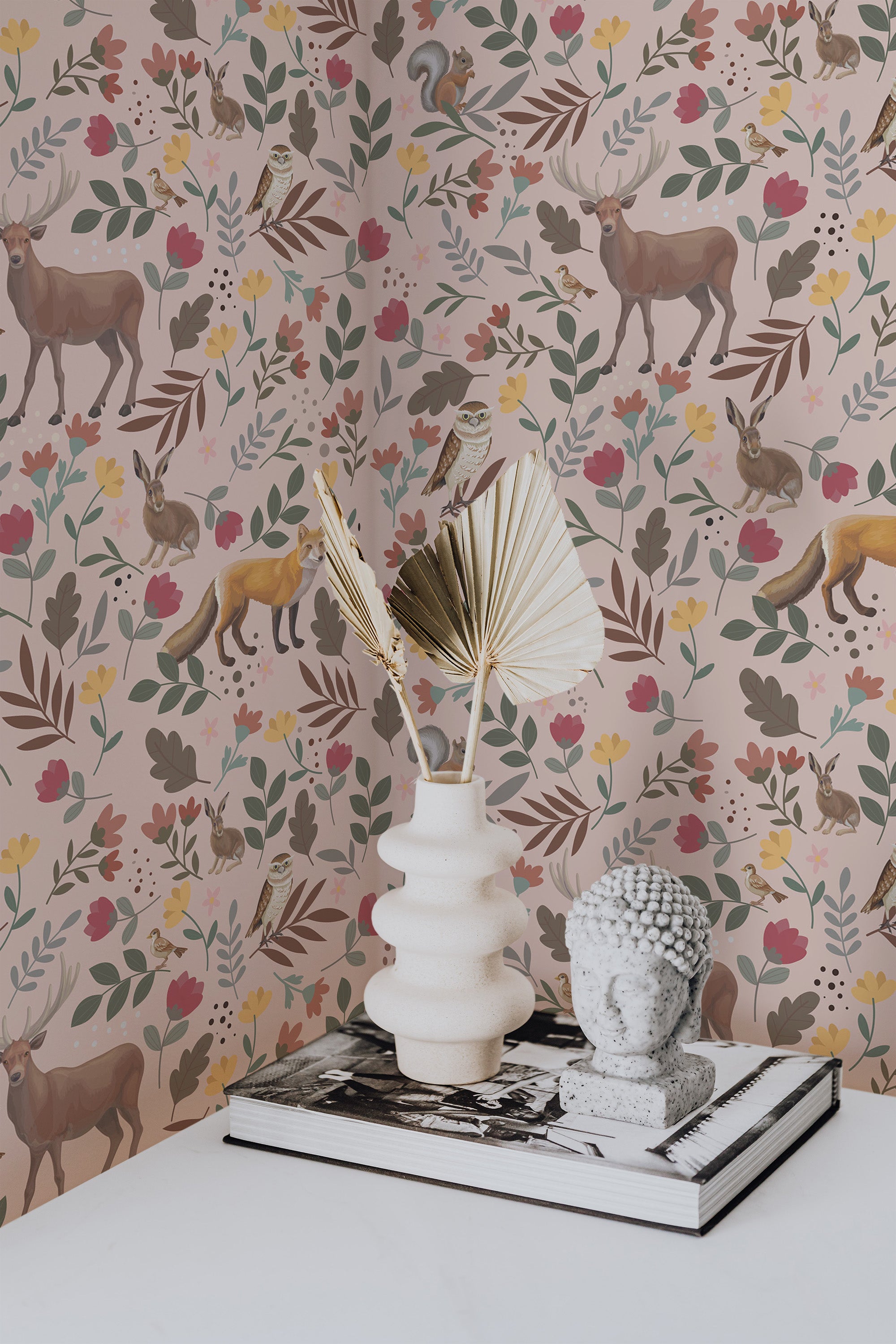 Self-adhesive wallpaper with a pink Scandinavian forest theme, incorporating playful woodland animals such as deer, foxes, and birds surrounded by colorful leaves and flowers in shades of pink, green, and yellow.