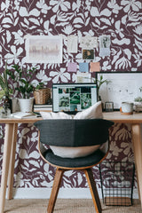 Self-adhesive wallpaper with a Burgundy background paired with soft, contrasting white botanical shadows in an elegant nature-inspired pattern.