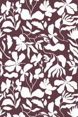 Floral pattern with white botanical silhouettes of leaves and flowers on a rich burgundy background, peel and stick removable wallpaper.