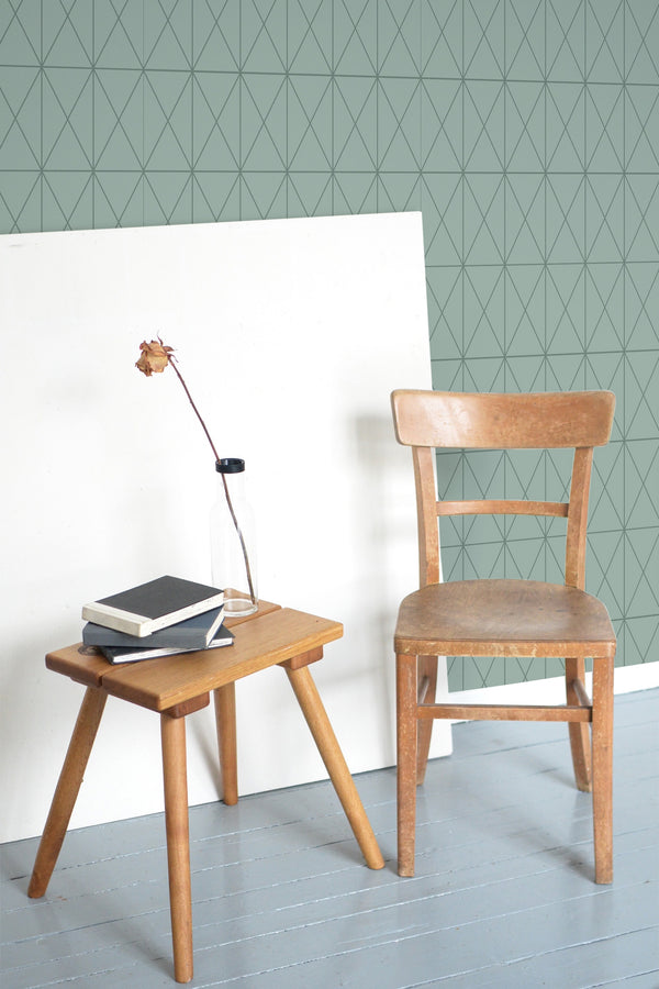 wooden table chair decorative plant blank canvas green geometric tile self adhesive wallpaper