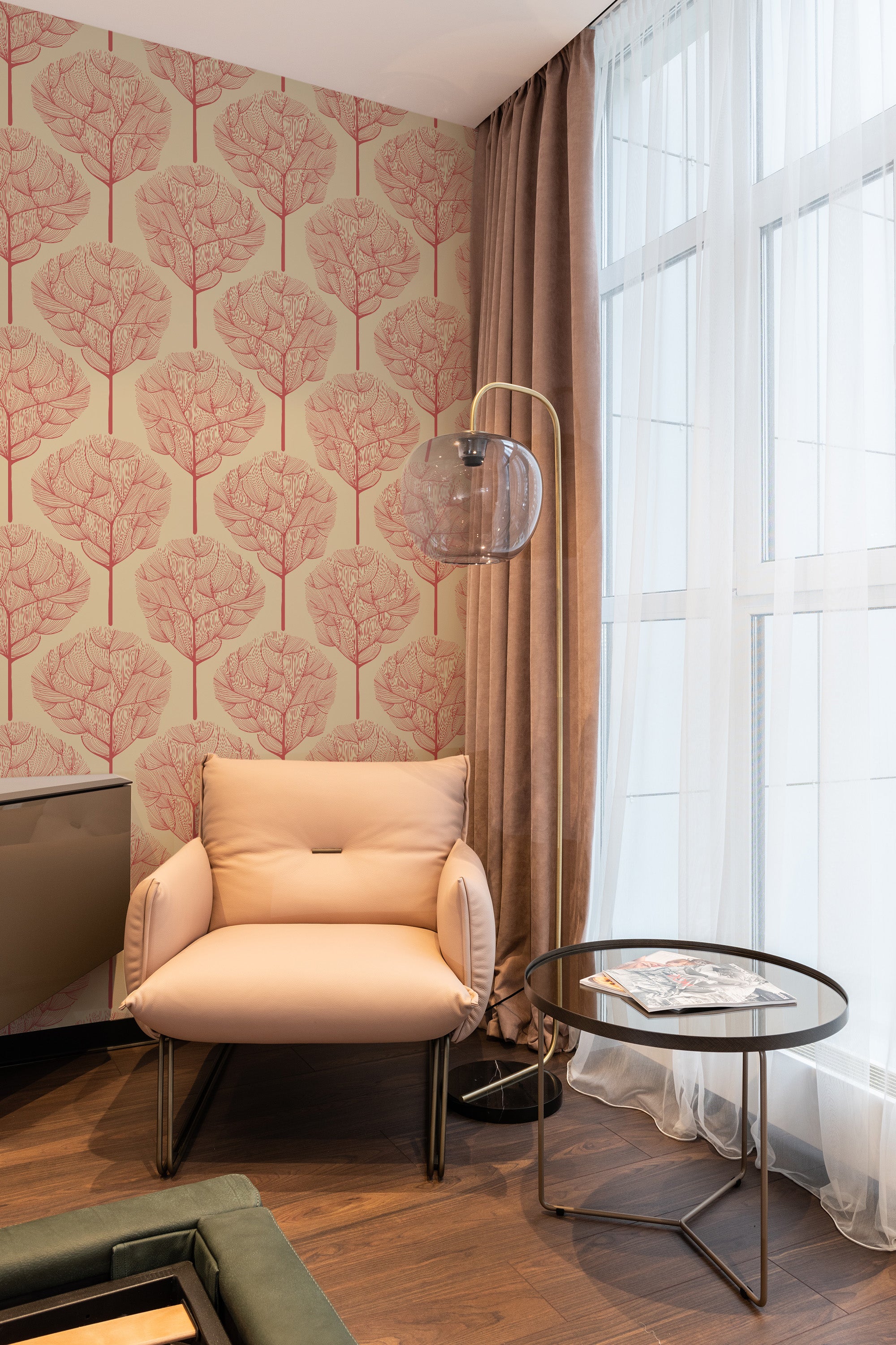 Wallpaper with a repeating red oak tree pattern on a soft beige background. The design offers a warm and nature-inspired aesthetic, complementing the room's modern d��cor while maintaining an elegant and timeless appeal. Traditional wallpaper.