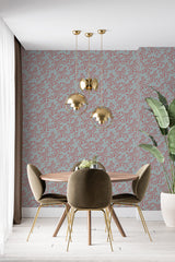 modern dining area velour chair plant red branch accent wall