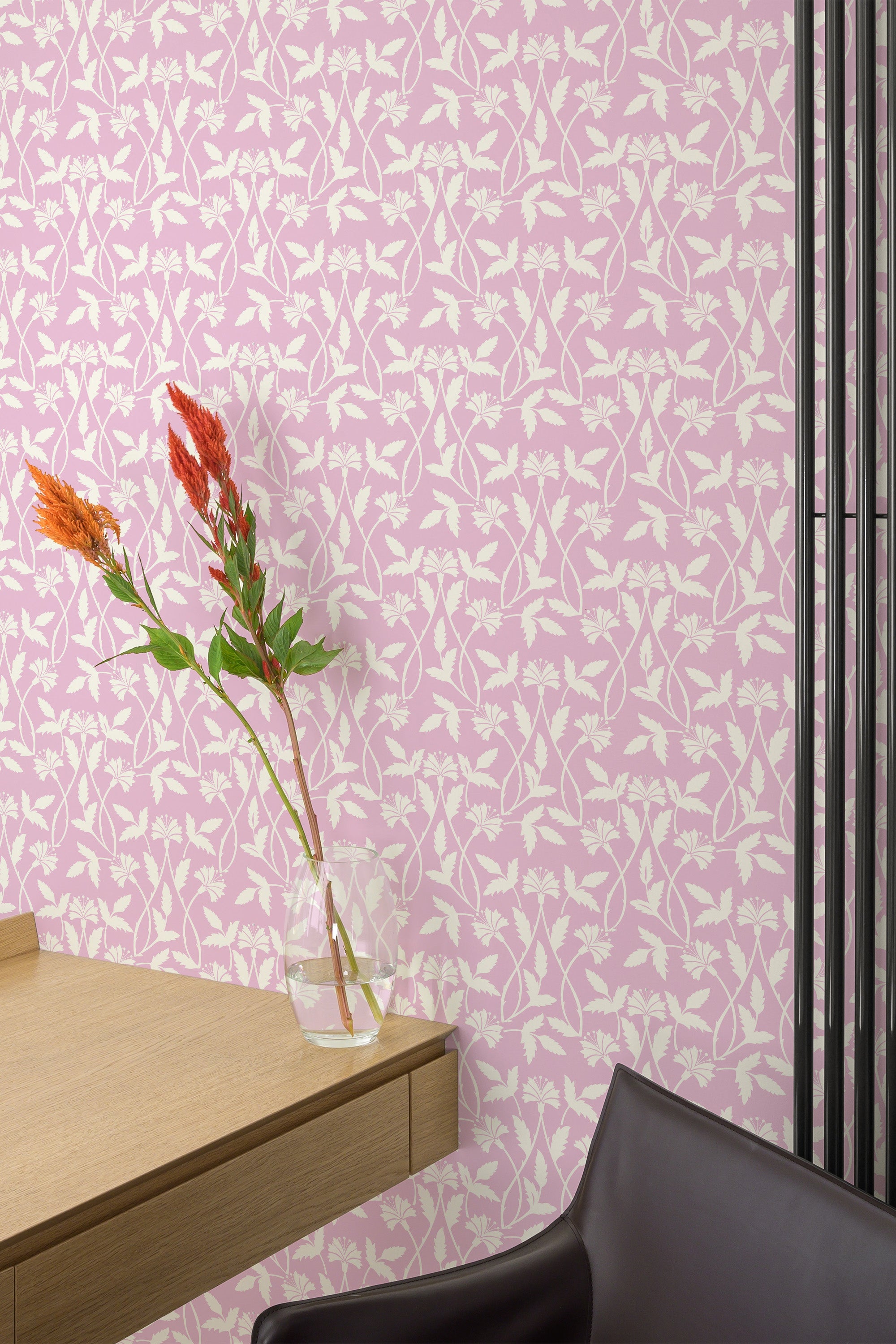 Self-adhesive wallpaper with a Summer Pink design that has delicate white floral patterns on a soft pink background, creating a fresh and elegant look in the room.