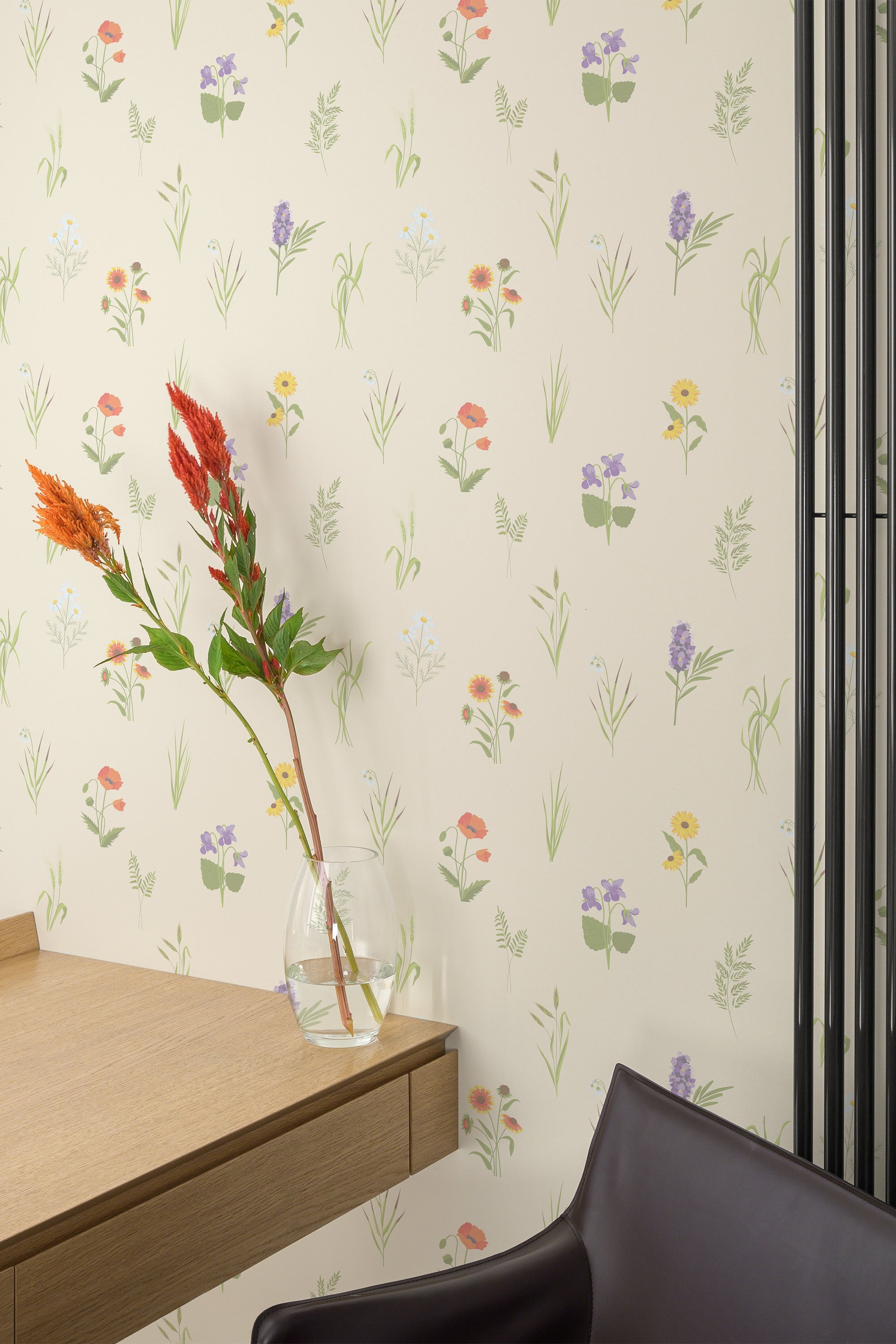 Self-adhesive wallpaper with a light floral nursery design on a cream background, adorned with delicate pastel flowers and green leaves, creating a soft and calming atmosphere.