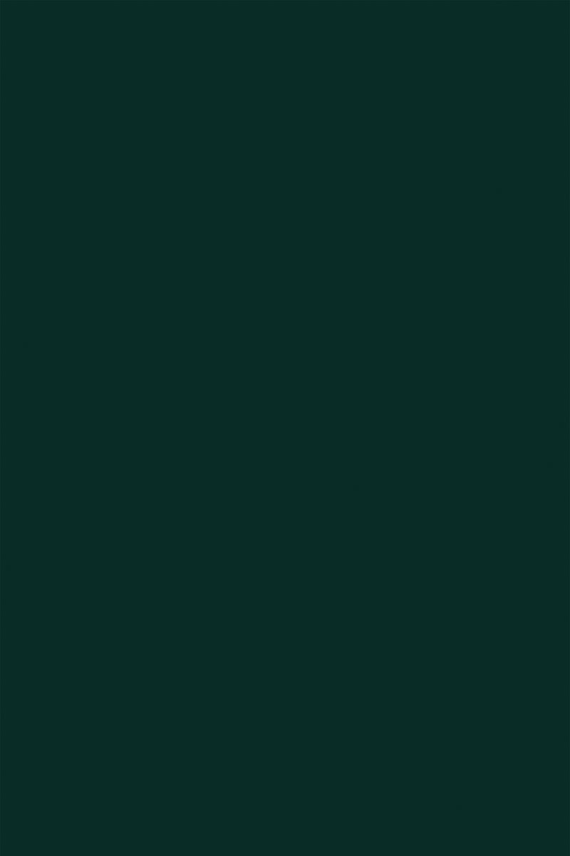 Deep forest green solid color background with a matte finish, peel and stick removable wallpaper.