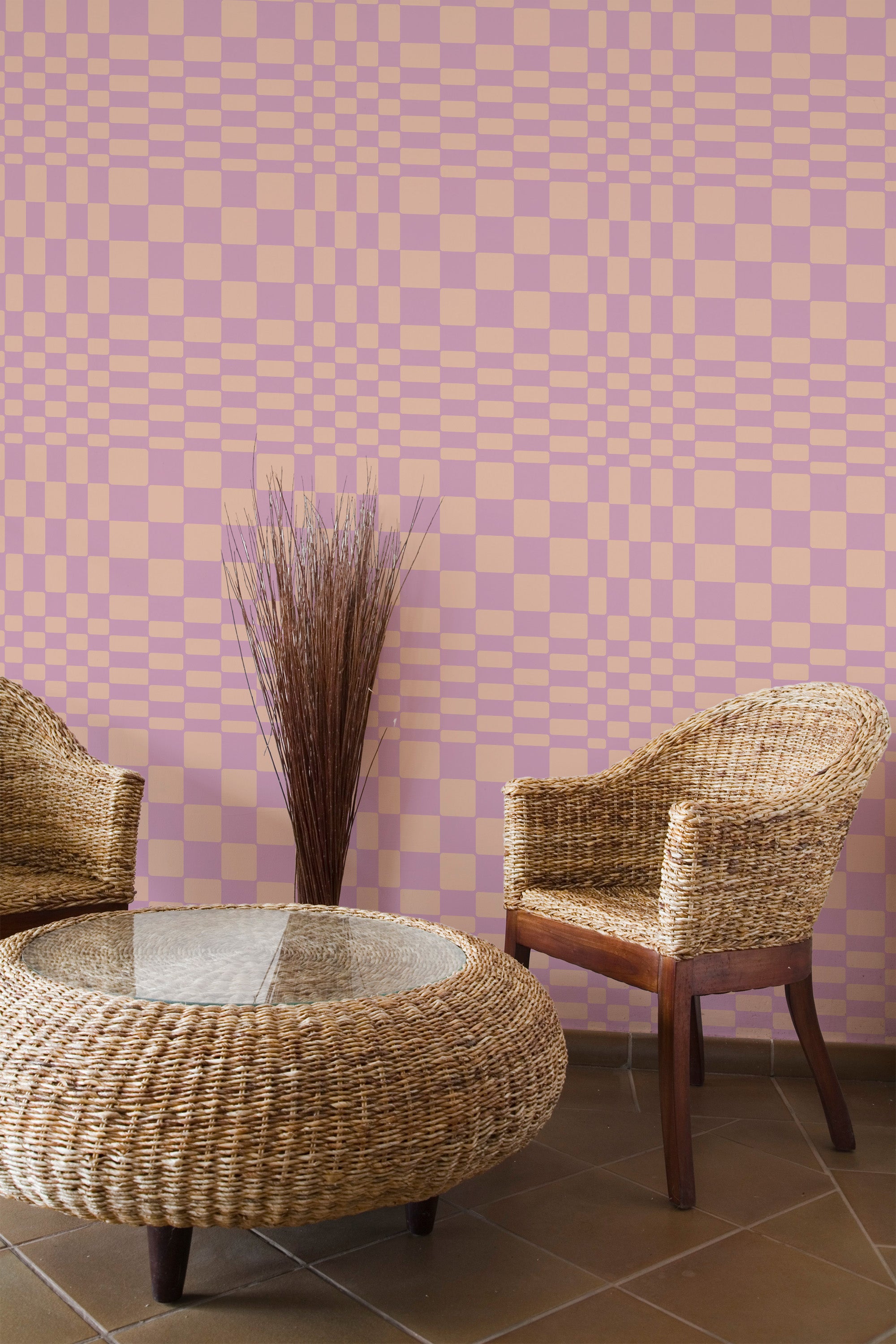 Self-adhesive wallpaper with a funky illusion design of interwoven pink and cream checkered patterns creating a captivating 3D effect.