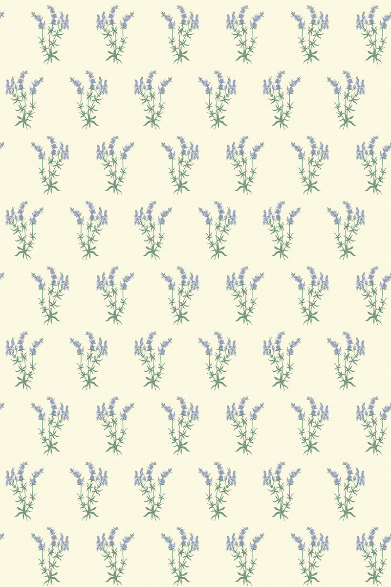 Lavender sprigs in soft purple with green stems and leaves repeat in a consistent, evenly spaced pattern on a light beige background. Peel and stick removable wallpaper.