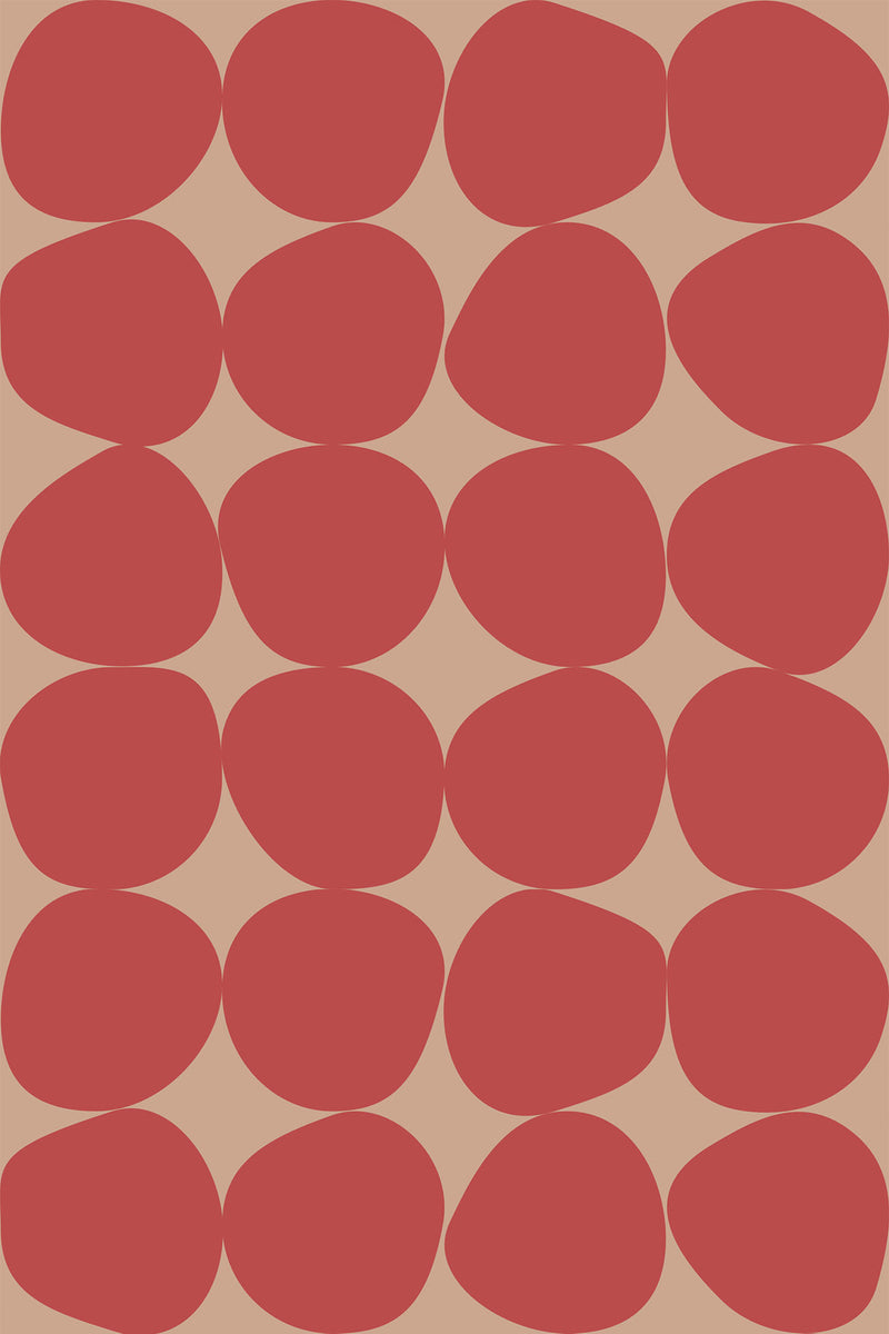 Red oval shapes arranged in a repeating pattern on a peach background, peel and stick removable wallpaper.