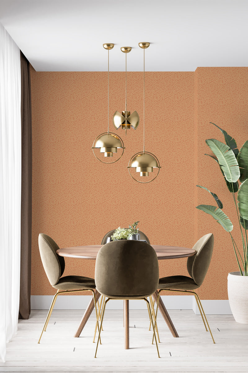 modern dining area velour chair plant autumn branch accent wall