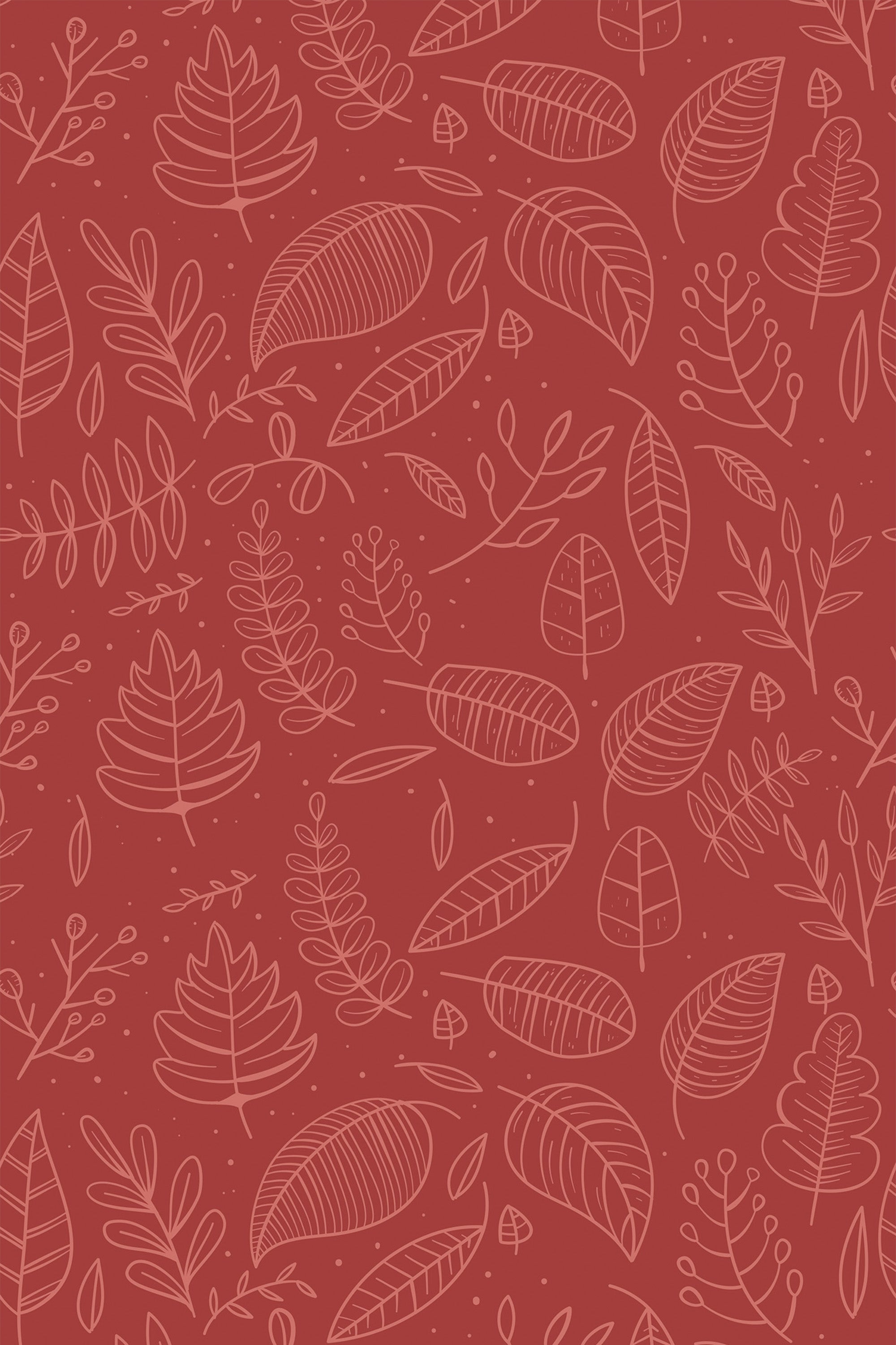 Red peel and stick removable wallpaper with white line art of various autumn leaves and small accent dots.