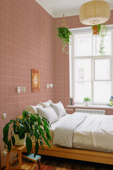 stick and peel wallpaper small pink tile pattern bedroom boho wall decor green plants