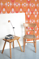 wooden table chair decorative plant blank canvas orange retro circles self adhesive wallpaper