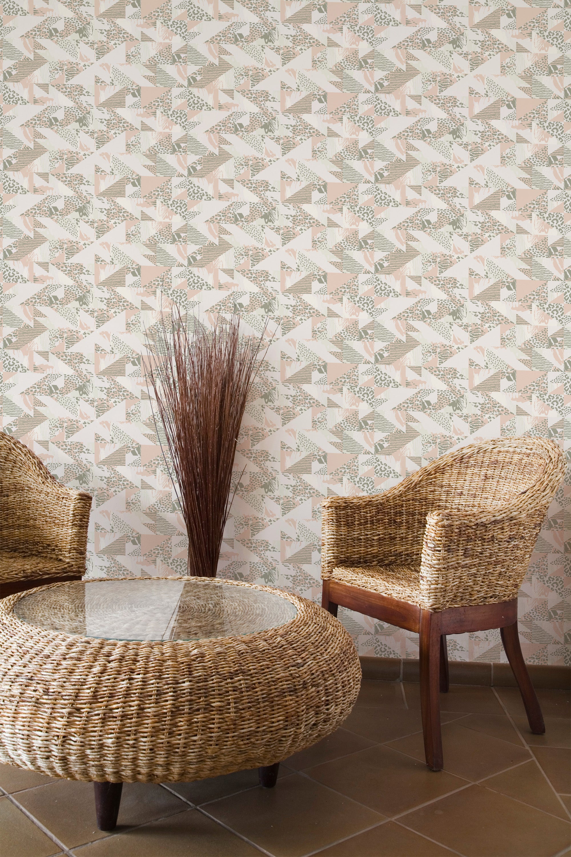 Self-adhesive wallpaper with geometric animal print, including stylized renderings of deer heads arranged in a repetitive triangular pattern in muted tones.