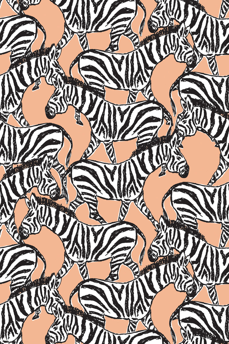 A pattern of black and white striped zebras on a peach-colored background, in a repeating motif, peel and stick removable wallpaper.