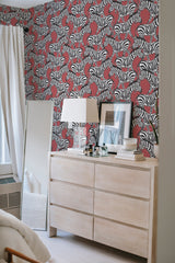        
peel and stick wallpaper red zebra accent wall bedroom dresser mirror minimalist interior